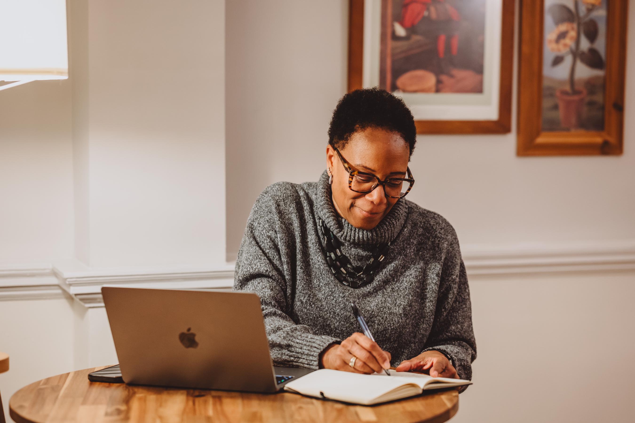Val Mattinson in a coaching session with a client, showing a collaborative and supportive environment